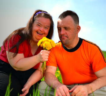 two people smiling